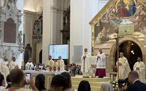 Pope Leo XIV celebrates Mass in the Basilica of Santa Maria degli Angeli in Assisi, Italy, which houses the Porziuncola, the small chapel closely associated with the life and early vocation of St. Francis, Aug. 6, 2026. (NCR photo/Camillo Barone)