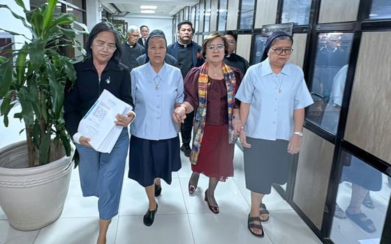 Sr. Geraldine Denoga, right, is one of three Daughters of Charity who filed an impeachment complaint against Vice President Sara Duterte on Feb. 9, 2026. She is accompanied by Sr. Nieves Servito, second from left, who came to support her fellow Daughters of Charity. (Courtesy of Office of Representative Leila de Lima)