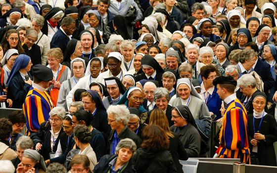 The heads of women's religious orders leave an audience with Pope Francis in Paul VI hall at the Vatican May 12, 2016. During the session with members of the International Union of Superiors General, sisters asked Francis about the possibility of women deacons returning to the church. (CNS/Paul Haring)
