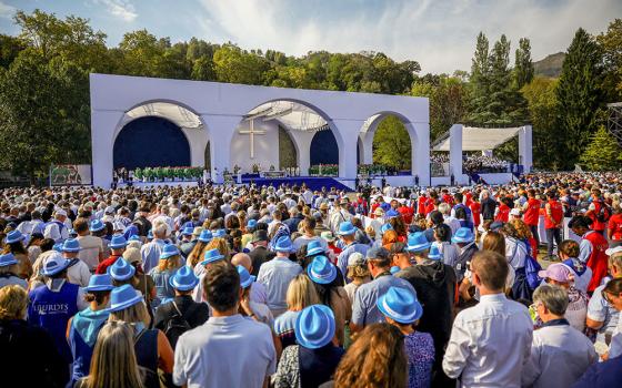 Pope Leo XIV celebrates Sunday Mass at the field alongside the Sanctuary of Our Lady of Lourdes, as part of his four-day apostolic journey to France, Sept. 27, 2026. (OSV News/Reuters/Stephane Mahe)
