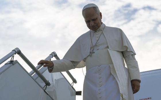 Pope Leo XIV descends the stairs of the papal plane upon arriving at Metz-Nancy-Lorraine International Airport Sept. 28, 2026, during his apostolic journey to France. (CNS/Vatican Media)