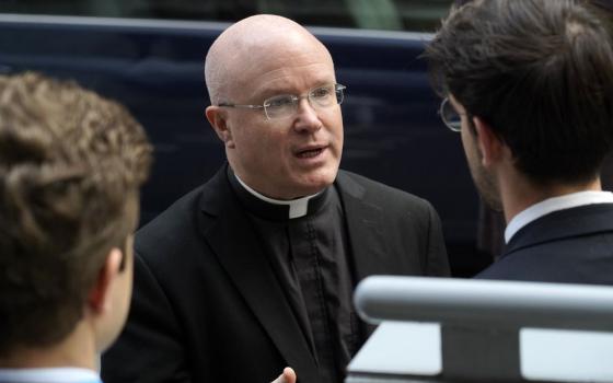 Msgr. Roger Landry, director of the Pontifical Mission Societies USA, speaks with people outside Holy Family Church in New York City Sept. 9, 2024. (OSV News/Gregory A. Shemitz)