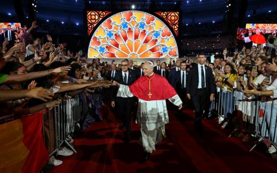 Pope Leo XIV greets young people during a prayer vigil at the Stade de France in Saint-Denis, France, Sept. 25, 2026, as part of the pope's four-day apostolic journey to France. (OSV News photo/Vatican Media/Simone Risoluti)