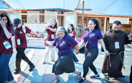 St. Joseph of the Apparition Sr. Muna Totah dances at a festival that brought together youth from Galilee and youth from the St. James Vicariate in Jerusalem in October 2025. (Courtesy of St. James Vicariate)