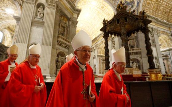 Bishop J. Douglas Deshotel of Lafayette, La., center, and other U.S. bishops arrive to concelebrate Mass in the crypt of St. Peter's Basilica at the Vatican Dec. 5, 2019. (CNS/Paul Haring)