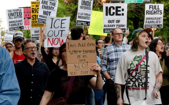 Demonstrators opposed to U.S. Immigration and Customs Enforcement, or ICE, march through the streets during a protest in the Albany Park neighborhood of Chicago June 3, 2026, against immigration enforcement operations by federal agents. (OSV News/Reuters/Jim Vondruska)