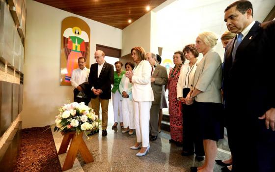 U.S. Rep. Jim McGovern, second from the left, stops with a congressional delegation in August 2019 at Central American University in San Salvador where six murdered Jesuit priests who influenced his work and faith are buried. McGovern led the delegation to El Salvador to study causes of migration. (CNS/Courtesy of Rep. Jim McGovern)