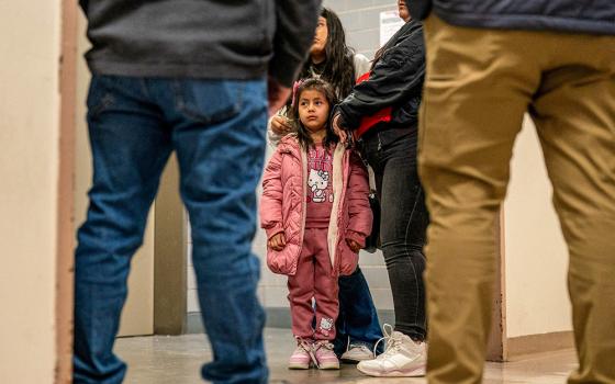 The family of a detained migrant speaks to immigration officers in an attempt to gain information at a U.S. immigration court in the Manhattan borough of New York City Jan. 16, 2026. (OSV News/Reuters/David 'Dee' Delgado)