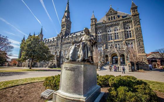 A statue of Baltimore Archbishop John Carroll, the first Catholic bishop in the United States and founder of Georgetown University, is seen on the Jesuit-run school's Washington campus March 3, 2022. (OSV News/Chaz Muth)