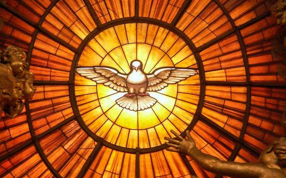 Sculptures surround stained glass depicting the Holy Spirit as a dove, by Gian Lorenzo Bernini circa 1660, in St. Peter's Basilica at the Vatican. (Wikimedia Commons/Dnalor 01)