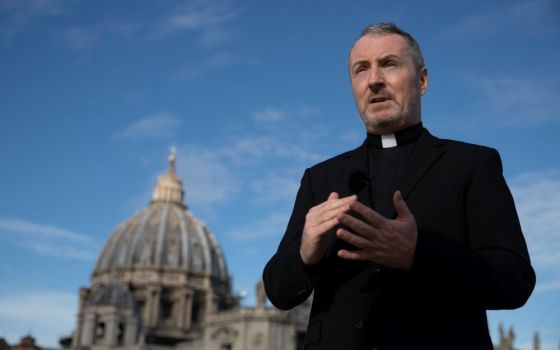 Monsignor John Kennedy, the head of the Congregation for the Doctrine of the Faith discipline section, speaks during an interview on the terrace of the Congregation for the Doctrine of the Faith offices at the Vatican, Dec. 9, 2019. 