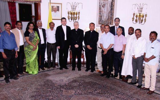 Archbishop Giambattista Diquattro (center), who was apostolic nuncio to India and Nepal from Jan. 21, 2017, to Aug. 29, 2020, with a group of Christian media persons in New Delhi on April 25, 2018 (Provided photo)
