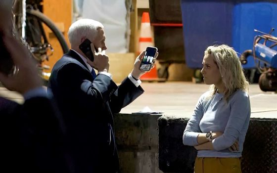 In this image from video released by the House Select Committee, Vice President Mike Pence looks at a tweet by President Donald Trump from his secure evacuation location on Jan. 6, 2021.
