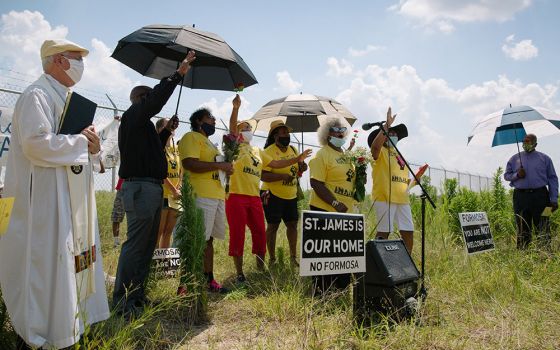 Faith leaders gather at the site of a planned $9.4 billion plastics manufacturing complex in St. James Parish, Louisiana, during a 2020 Juneteenth commemoration hosted by Rise St. James, a community group fighting construction of the plant.