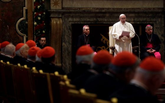 Pope Francis speaks during the traditional greetings to the Roman Curia in the Sala Clementina (Clementine Hall) of the Apostolic Palace at the Vatican on Dec. 22, 2016. (AP/Gregorio Borgia, Pool)
