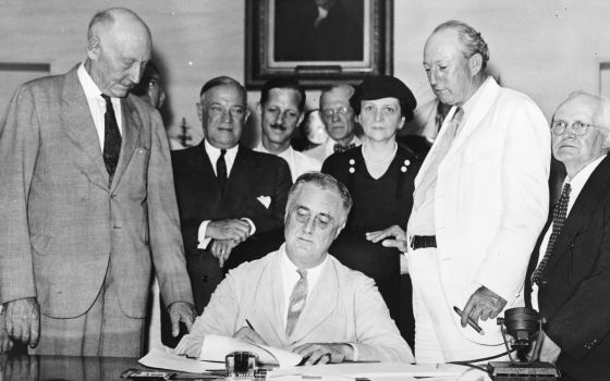 President Franklin D. Roosevelt signs the Social Security Act Aug. 14, 1935. It was one several programs Roosevelt enacted from 1933 to 1939 as part of the New Deal, intended to stabilize the country's economy and provide relief to American workers and fa