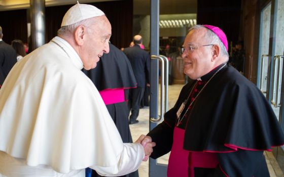 Pope Francis greets Archbishop Charles J. Chaput of Philadelphia before a session of the Synod of Bishops on young people, the faith and vocational discernment at the Vatican Oct. 16, 2018. (CNS/Vatican Media)