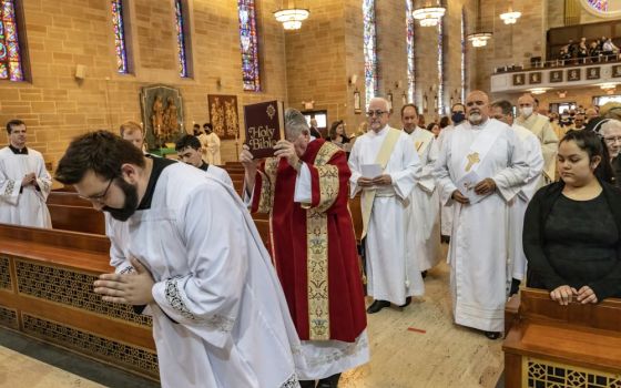 The congregation looks on during the procession of Mass in St. Mary of the Assumption Cathedral in Trenton, N.J., Oct. 17, 2021, as Trenton Bishop David M. O'Connell officially began the local process for his diocese's participation in preparations for th