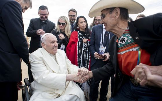 Pope Francis and Chief Wilton Littlechild say farewell July 29 in Iqaluit, Nunavut, as the pope prepares to return to the Vatican after a six-day visit to Canada. 