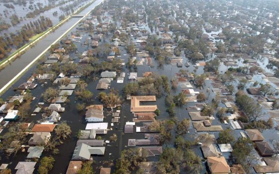 Houses in New Orleans are seen under water Sept. 5, 2005, after Hurricane Katrina swept through Louisiana, Mississippi and Alabama. (CNS/Reuters/Allen Fredrickson)