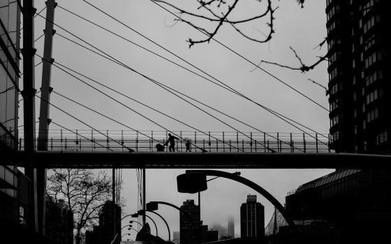 people on a bridge 
