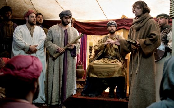 St. Francis of Assisi (Alexander McPherson) appears before the court of Egyptian Sultan Malik al-Kamil (Zack Beyer) in a scene from the documentary film "The Sultan and the Saint," which premieres on PBS Dec. 26. (UPF)