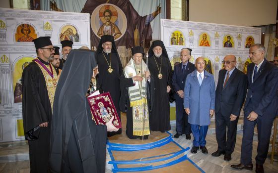 Ecumenical Patriarch Bartholomew of Constantinople leads the official door-opening ceremony of lower Manhattan's St. Nicholas Greek Orthodox Church on Tuesday, Nov. 2, 2021. (AP Photo/Ted Shaffrey)