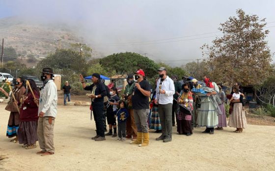 Apache Stronghold, a coalition of Apaches, other Native peoples and non-Native supporters seeking to preserve Oak Flat, arrives at Wishtoyo Chumash Village to begin a ceremonial circle, Sunday, Oct. 17, in Malibu, California. (RNS photo/Alejandra Molina)