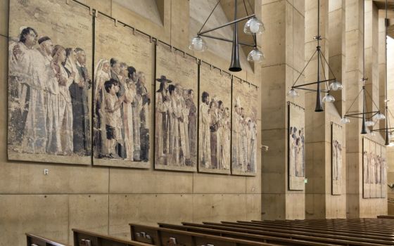 Tapestries depicting saints are seen in the Cathedral of Our Lady of the Angels in Los Angeles. (Dreamstime/Luis E. Torres Franco)