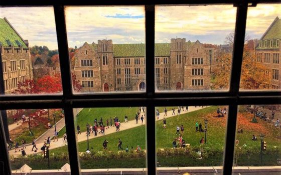 Students walk through a quadrangle on the campus of Boston College in this 2018 photo. (Wikimedia Commons/BCLicious)