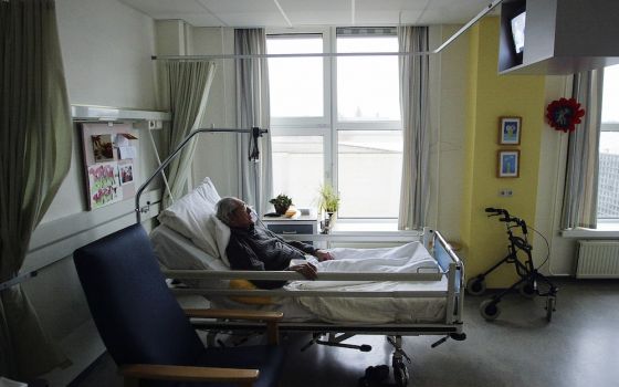 An unidentified man with Alzheimer's disease, who refused to eat, sleeps peacefully the day before passing away in a nursing home in Utrecht, Netherlands. (CNS/Reuters/Michael Kooren)
