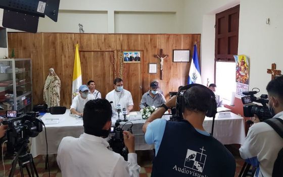 Members of the Diocese of Chalatenango, El Salvador, gather at a news conference Oct. 26, to speak in favor of farmers and families affected by increased government militarization in their region, which borders with Honduras. 