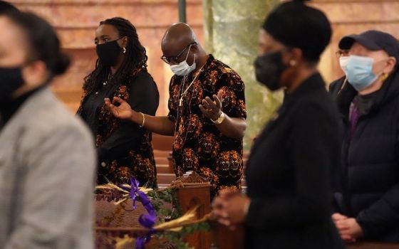 Worshippers pray during a Black History Month Mass of thanksgiving Feb. 28, 2021, at the Co-Cathedral of St. Joseph in Brooklyn, N.Y. The liturgy was sponsored by the Vicariate of Black Catholic Concerns of the Diocese of Brooklyn. (CNS photo/Gregory A. S