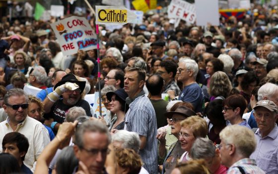 Catholics are among others attending a rally to urge global action on climate change in New York Sept. 21, 2014.  (CNS/Reuters/Eduardo Munoz)