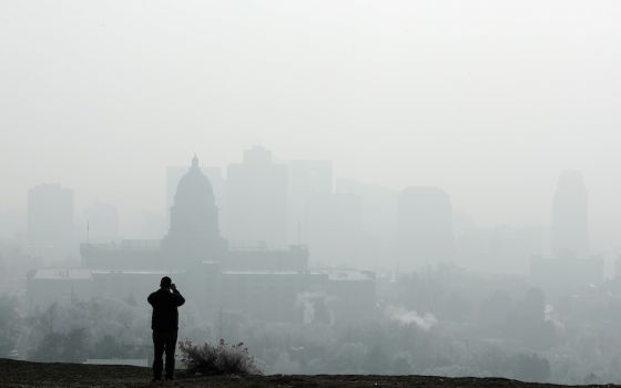 Utah State Capitol and buildings shrouded in smog in downtown Salt Lake City Dec. 12, 2017. (CNS/Reuters/George Frey)