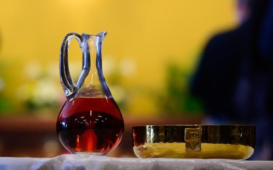 A cruet and ciborium hold wine and bread that will become the Body and Blood of Christ during Mass inside the Mother of Mercy Hall at the National Shrine of Our Lady of Good Help in Champion, Wisconsin, April 28, 2019. (CNS/The Compass/Sam Lucero)