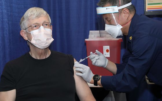 Dr. Francis Collins, director of the U.S. National Institutes of Health, receives his second dose of the COVID-19 vaccine at the NIH Clinical Center. (Courtesy of National Institutes of Health)