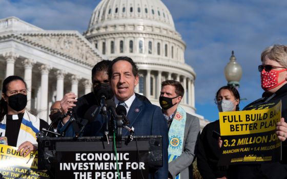 Rep. Jamie Raskin, D-Md. accompanied by the Rev. William Barber and the Poor People's Campaign talks to reporters about the need for the "Build Back Better" plan during a news conference on Capitol Hill in Washington, Oct. 27, 2021. (AP/Jose Luis Magana)