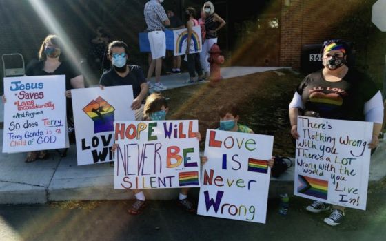 Protesters rally for Terry Gonda, a married lesbian who was fired from her role as music director at St. John Fisher Chapel University Parish in Auburn Hills, Michigan. (Between the Lines/Ellen Shanna Knoppow)