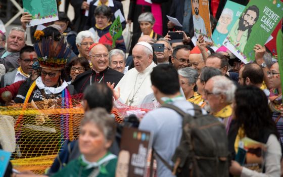 Pope Francis and Peruvian Cardinal Pedro Barreto Jimeno join a procession before the first session of the Synod for the Amazon on Oct. 7, 2019. (CNS photo/Vatican Media)