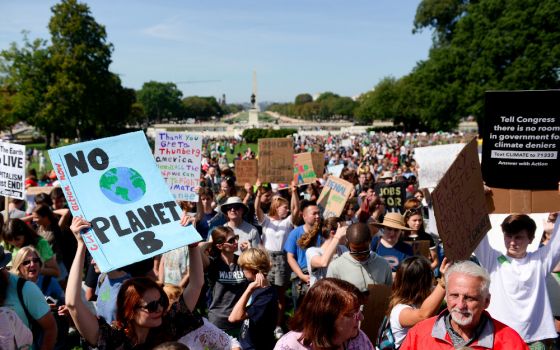 Climate change activists rally in Washington in September 2019. (CNS photo/Carol Zimmermann)
