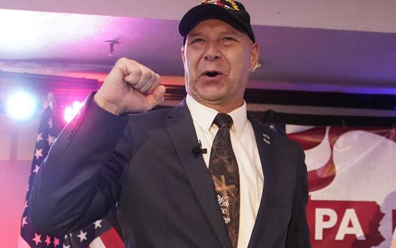 State Sen. Doug Mastriano, R-Franklin, the Republican candidate for governor of Pennsylvania, gestures to the cheering crowd during his primary night election party May 17 in Chambersburg, Pennsylvania. (AP photo/Carolyn Kaster)