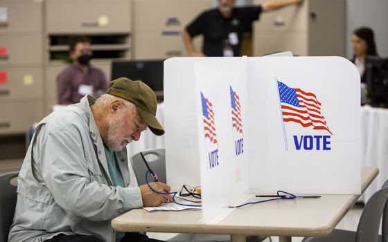 Voters cast their ballots Sept. 23 in Minneapolis. With Election Day still more than six weeks off, the first votes of the midterm election were already being cast that Friday in a smattering of states, including Minnesota. (AP photo/Nicole Neri)