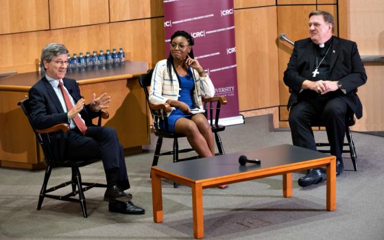 From left, Jeffrey Sachs, Christine Emba and Cardinal Joseph Tobin discuss capitalism and church social teaching at a Sept. 5 seminar at Fordham University's Lincoln Center campus in New York. (Fordham University/Leo Sorel)