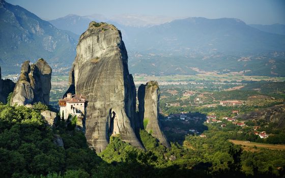 St. Barbara of Roussanou Monastery perches at the edge of a towering hilltop in Meteora, Greece. (Wikimedia Commons/Dennis D. Auger)