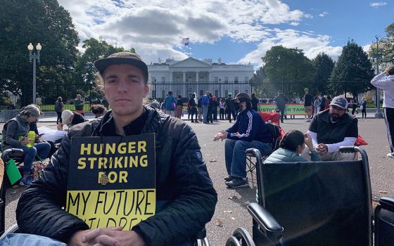 Paul Campion sits outside the White House in Washington, D.C., Oct. 26 during his hunger strike for climate action. (NCR photo/Melissa Cedillo)