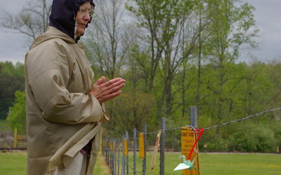 Presentation Sr. Mary Dennis Lenstch prays during a peace witness outside the Y-12 Nuclear Weapons Complex near Oak Ridge, Tennessee, in April 2011. (NCR photo/Joshua J. McElwee)