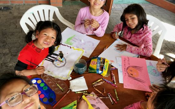 Girls from the Fundación Alalay children's home in Huajchilla, near La Paz, Bolivia, practice their drawing and painting skills. (Courtesy of Robert Aitchison)