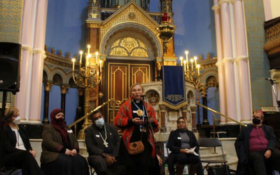 Representatives of Scottish religious communities participate in a multifaith dialogue on climate change at Glasgow's Garnethill Synagogue Oct. 31, 2021, ahead of the start of the COP26 U.N. climate conference. (NCR photo/Brian Roewe)