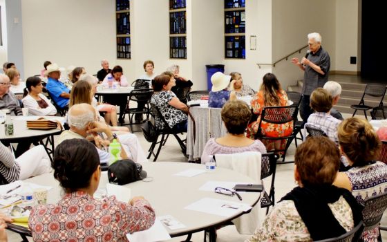 Fr. Bill Moore speaks during the Caring through Cancer talk at Holy Name of Mary in San Dimas, California, Aug. 20. The event brought caregivers, cancer survivors and newly diagnosed patients together to talk about their experiences. (Heather Adams)